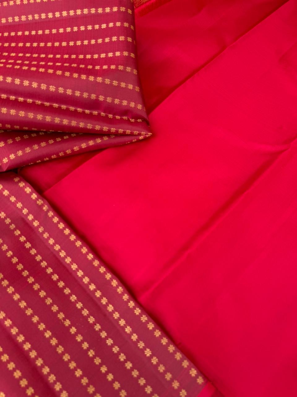 It is all about borderless kanchivarams - reddish maroon with all over tiny buttas