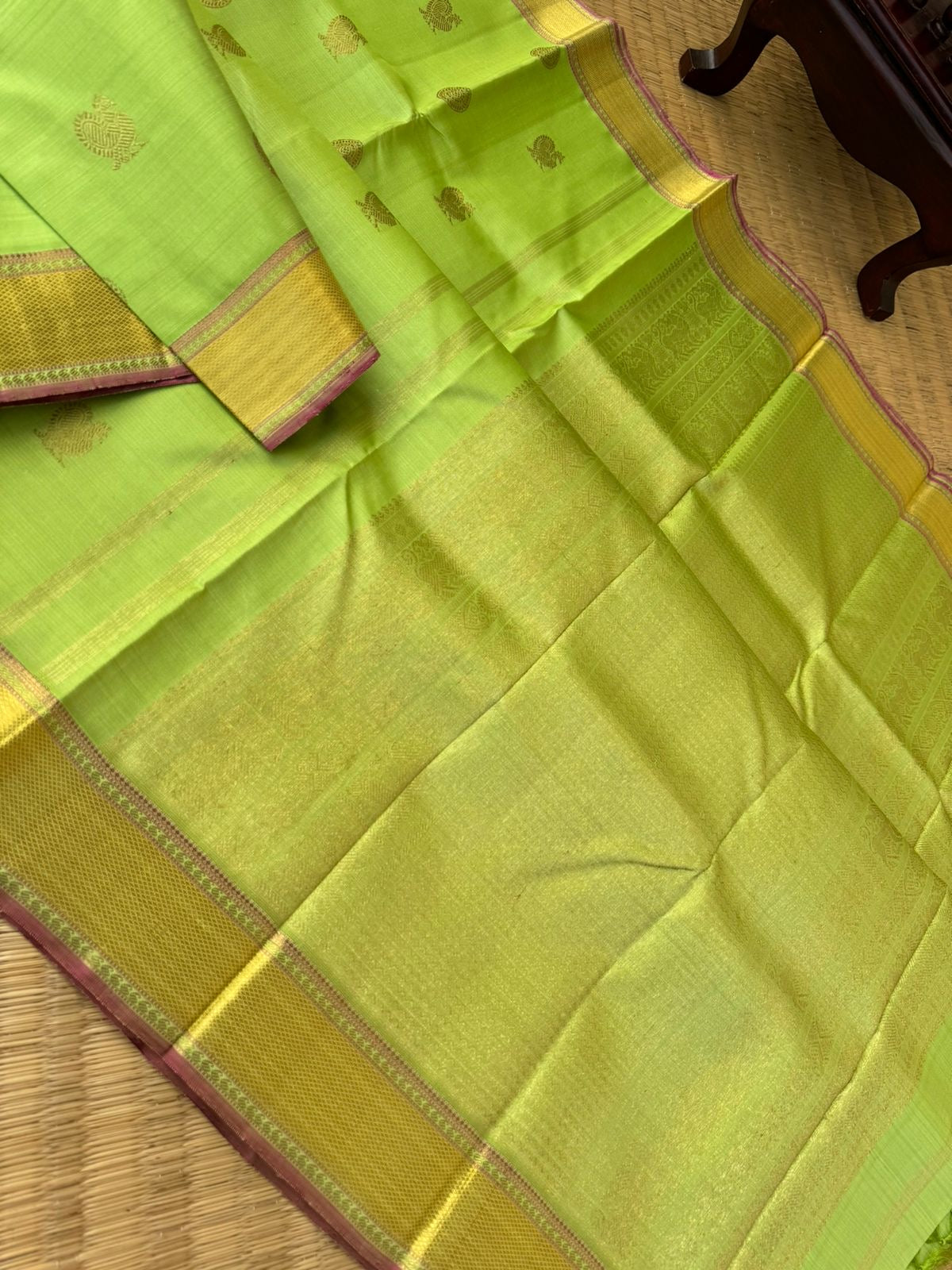 Pastel Ragas on Kanchivaram - pastel apple green Vairaoosi with Mayil chackaram woven buttas