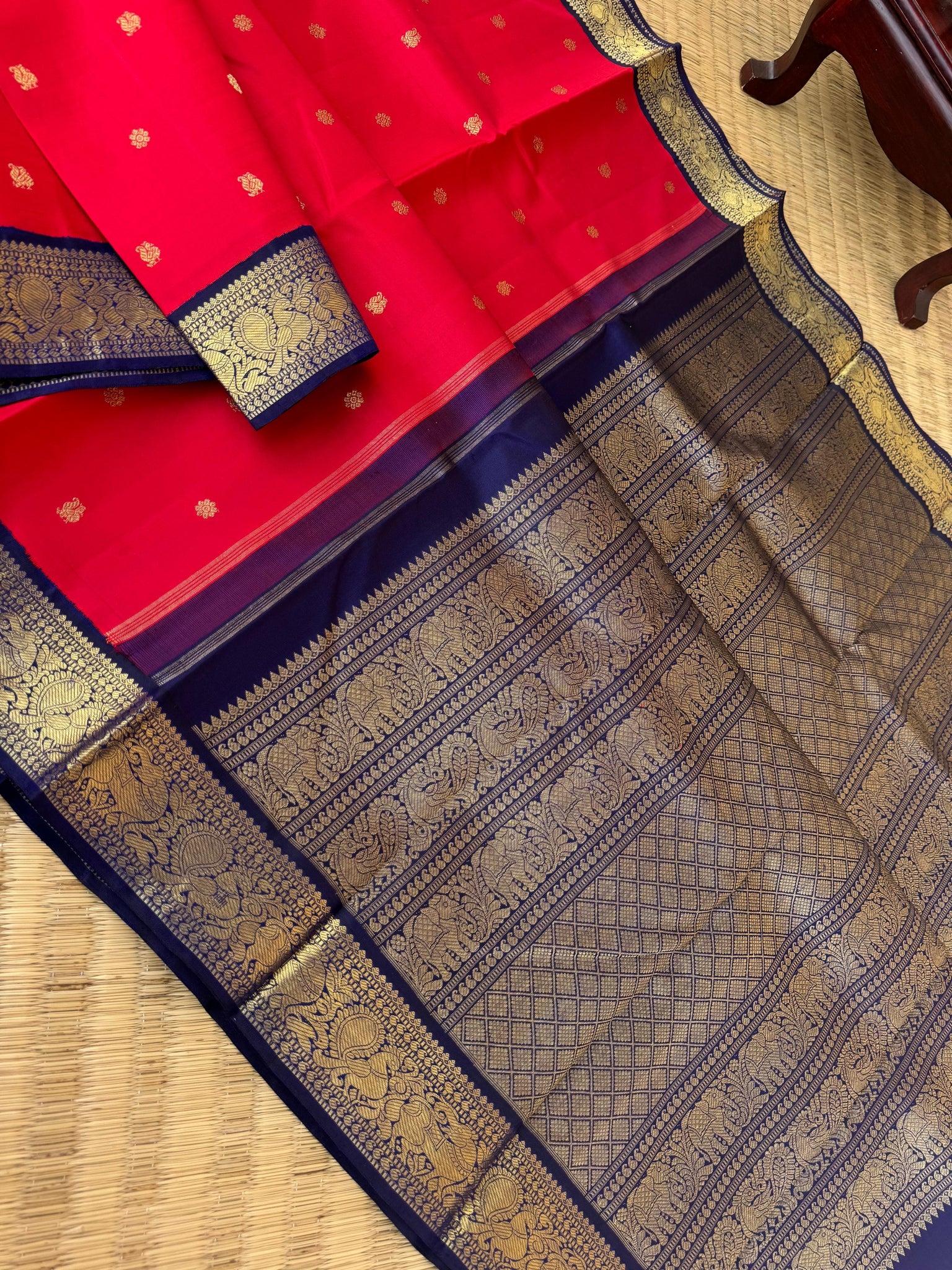 Tales of Korvais Kanchivaram - deep cherry red and navy blue is a vintage age old combination