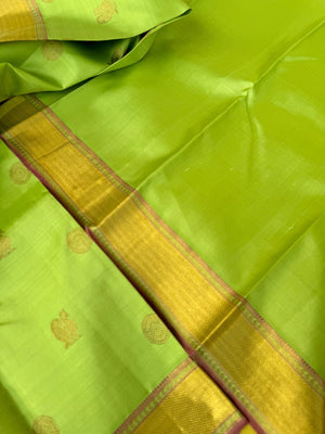 Pastel Ragas on Kanchivaram - pastel apple green Vairaoosi with Mayil chackaram woven buttas