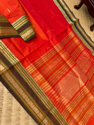 Zari Kissed Silk Cotton -beautiful orange with malli mokku woven buttas