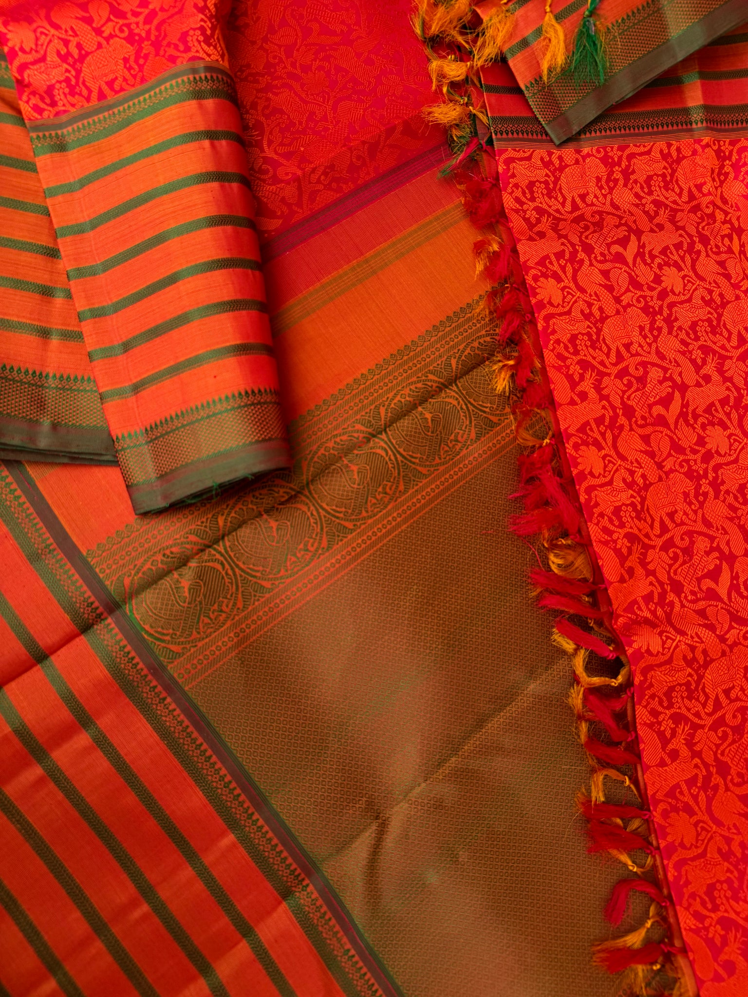 Haritham - Heirloom Yarn Play on Kanchivaram - rusty red vanasingaram woven body with varusai pett woven borders