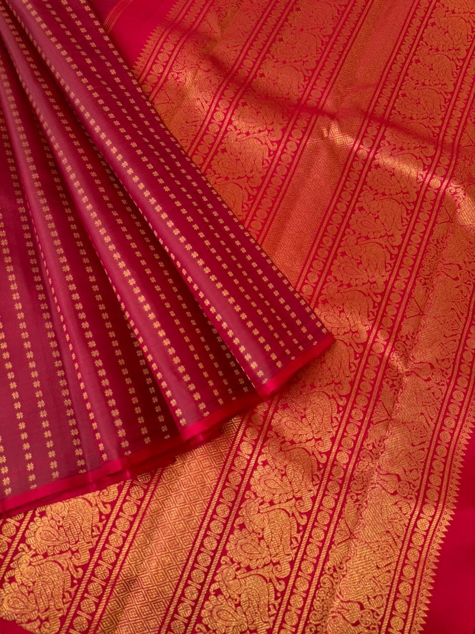 It is all about borderless kanchivarams - reddish maroon with all over tiny buttas