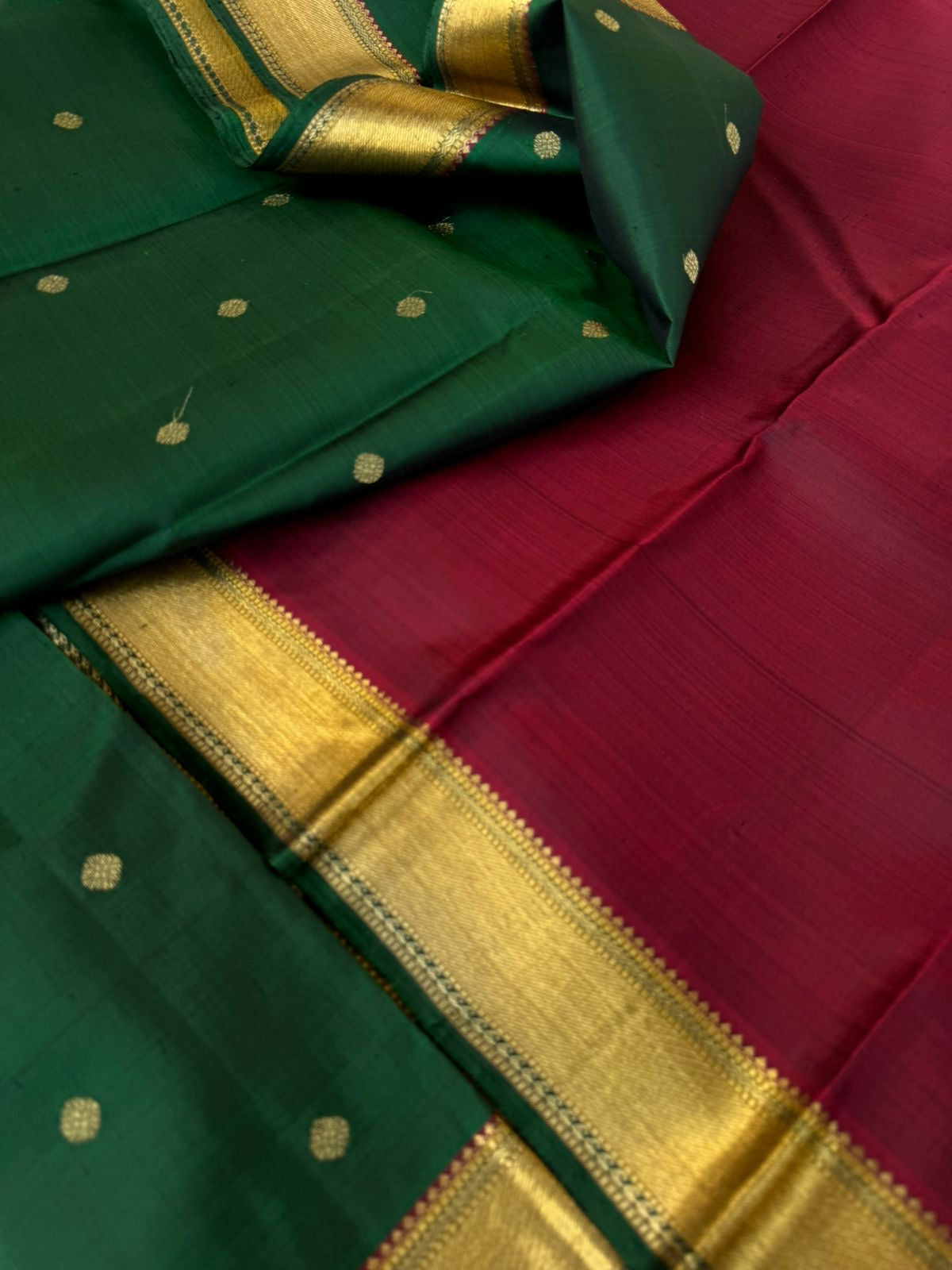 Swarnam - Stunning Solid Border Kanchivarams - the classy deep dark meenakshi green and maroon at its best