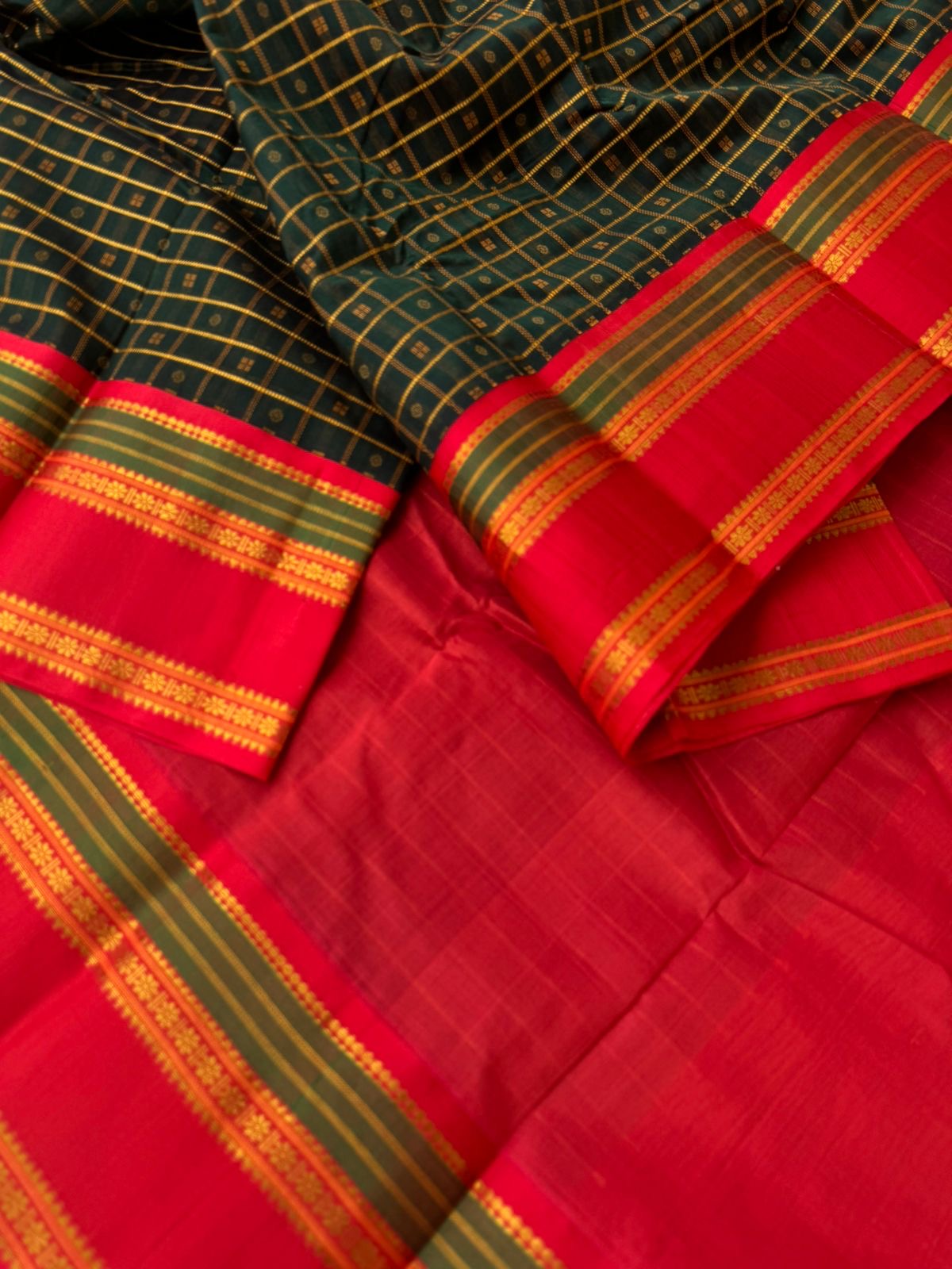 Divyam - Korvai Silk Cotton with Pure Silk Woven Borders - deep dark forest green on red