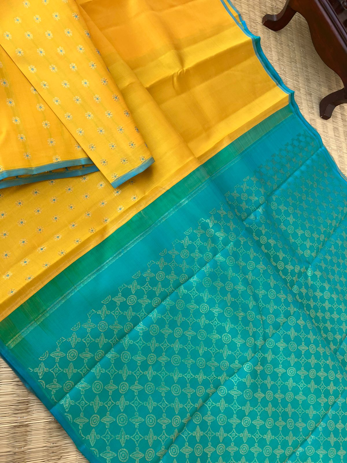 Colour Effects of Kanchivaram - beautiful one of a kind yellow and teal zari woven pallu and blouse with one side meenakarai woven buttas borders with plain body