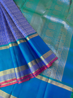 Haritham - Heirloom Yarn Play on Kanchivaram - absolutely stunning ms blue varusai pett woven body with beautiful gold zari woven borders pallu