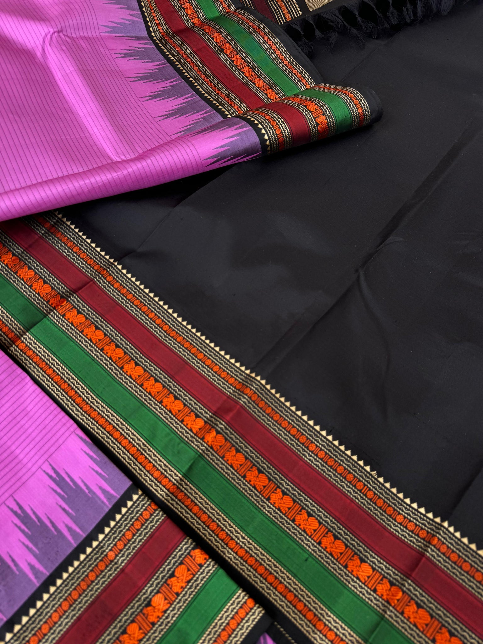 Sahasram - rose pink and black with gorgeous thread work woven borders and pallu