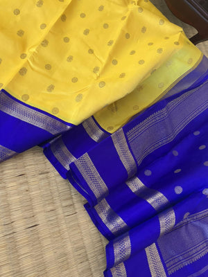 Meenakshi - Kanchivaram for Every Occasion - lovely lemon yellow and ms blue korvai Kanchivaram