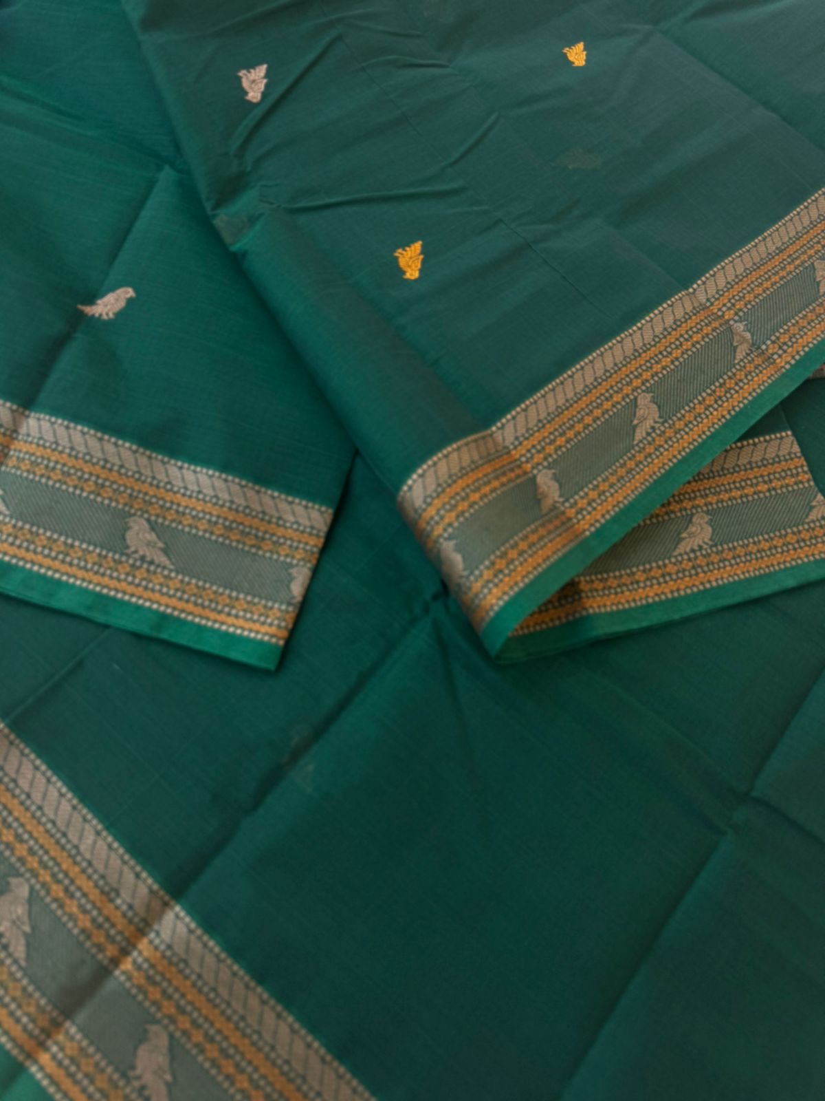 Mangalavastaram - deep dark Meenakshi green with parrots woven buttas