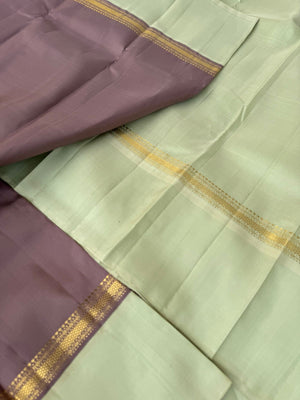 Interesting Kanchivarams - unusual chocolate grey and pastel pista green combination is never seen