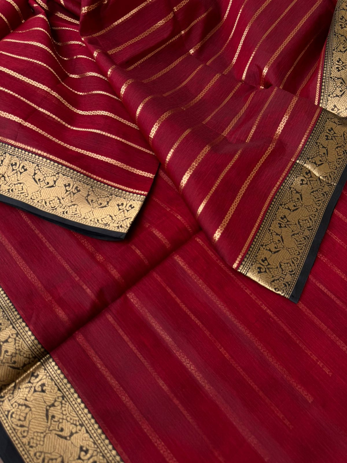 Zari Kissed Silk Cotton - wine maroon veldhari with black yali woven borders