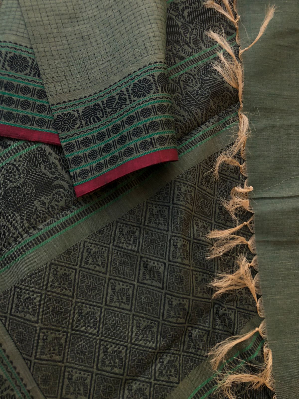 Mangalavastaram - a unusual army green grey podi kattam with grandest woven pallu