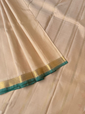 Shree - Stunning Small Border Kanchivarams - the natural tone of silk and small borders with green sleeve edge