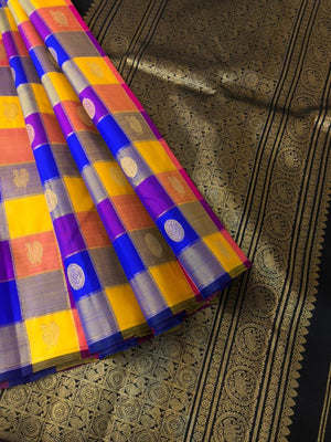 Paalum Palamum Kattam on Kanchivarams - amazing mix of blue violet pink and mustard chex woven body with black pallu and blouse