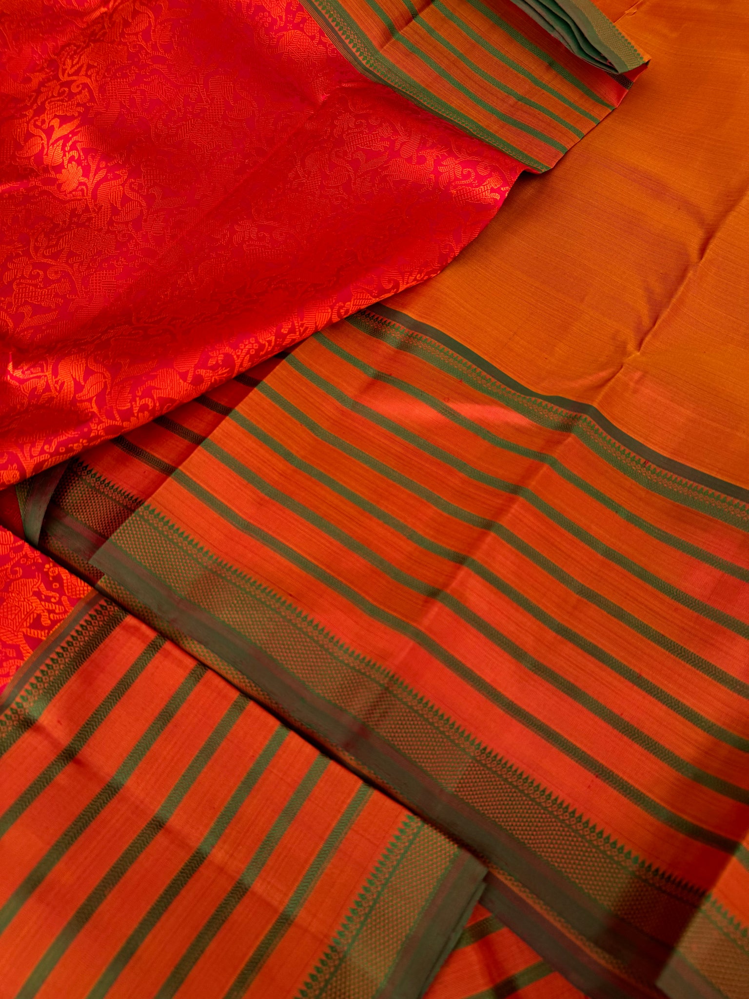 Haritham - Heirloom Yarn Play on Kanchivaram - rusty red vanasingaram woven body with varusai pett woven borders