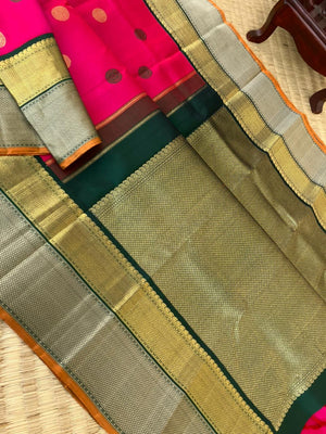 Vintage Vibes on Kanchivaram - the grandest pink and deep meenakshi green pattu and zari pett woven korvai borders with laddu kamalam woven borders