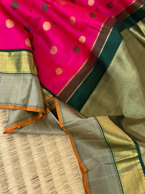 Vintage Vibes on Kanchivaram - the grandest pink and deep meenakshi green pattu and zari pett woven korvai borders with laddu kamalam woven borders