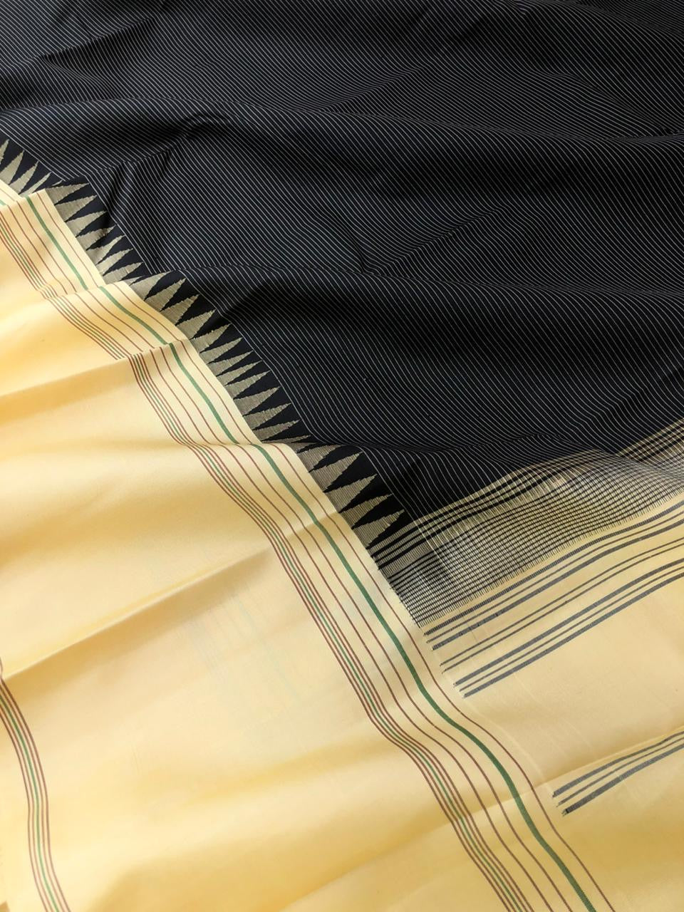 Kaavyam on Korvai Kanchivaram - the vintage beauty of black and cream off white ( venn pattu ) borders pallu and blouse