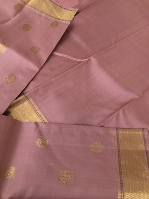 Aarabhi - Amazing Pastel Kanchivarams - stunning dusky rose gold Vairaoosi with solid gold zari woven borders