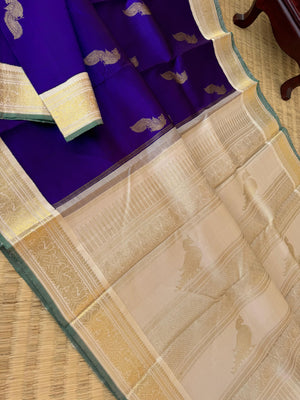 Tales of Korvais Kanchivaram - stunning violet and gold ivory with parrots woven buttas