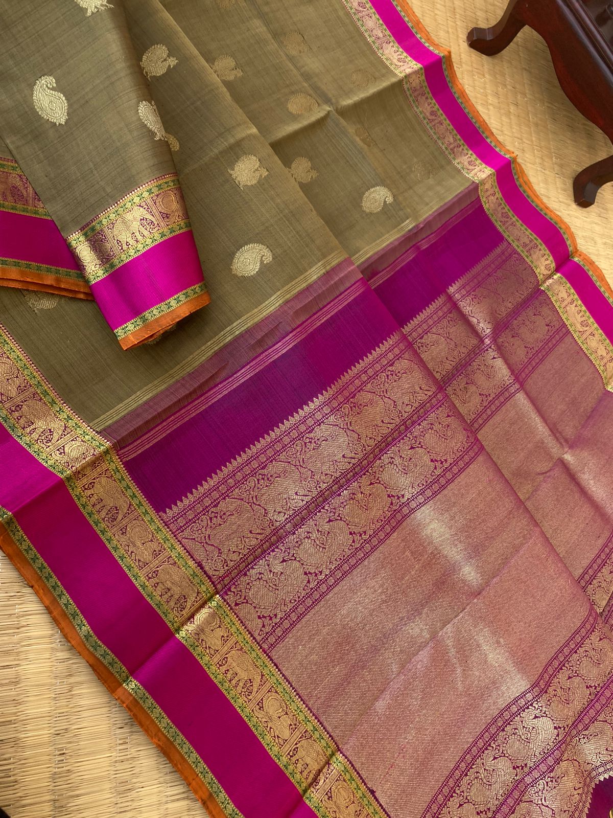 Heriyae - Molten Mettalic Kanchivarams - gorgeous metallic fenugreek bronze tone paisley and annapakshi woven buttas with majenta purple elephant motifs borders with grandest pallu