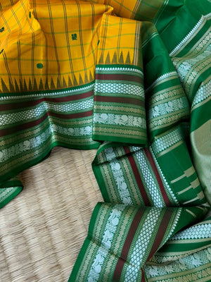 Pattu Pett - Exquisite No Zari Kanchivarams - mustard green with kattam and buttas woven borders with varusai pett motifs