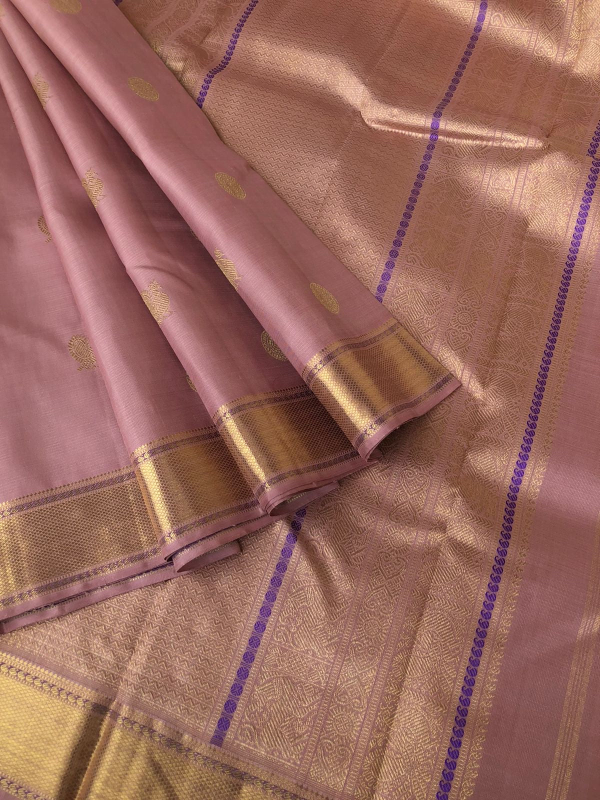 Aarabhi - Amazing Pastel Kanchivarams - stunning dusky rose gold Vairaoosi with solid gold zari woven borders