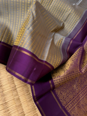 Kanchivaram Theory - stunning mustard mixed grey with vertical veldhari