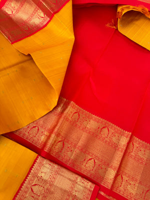 Tales of Korvais Kanchivaram - stunning traditional mustard and red