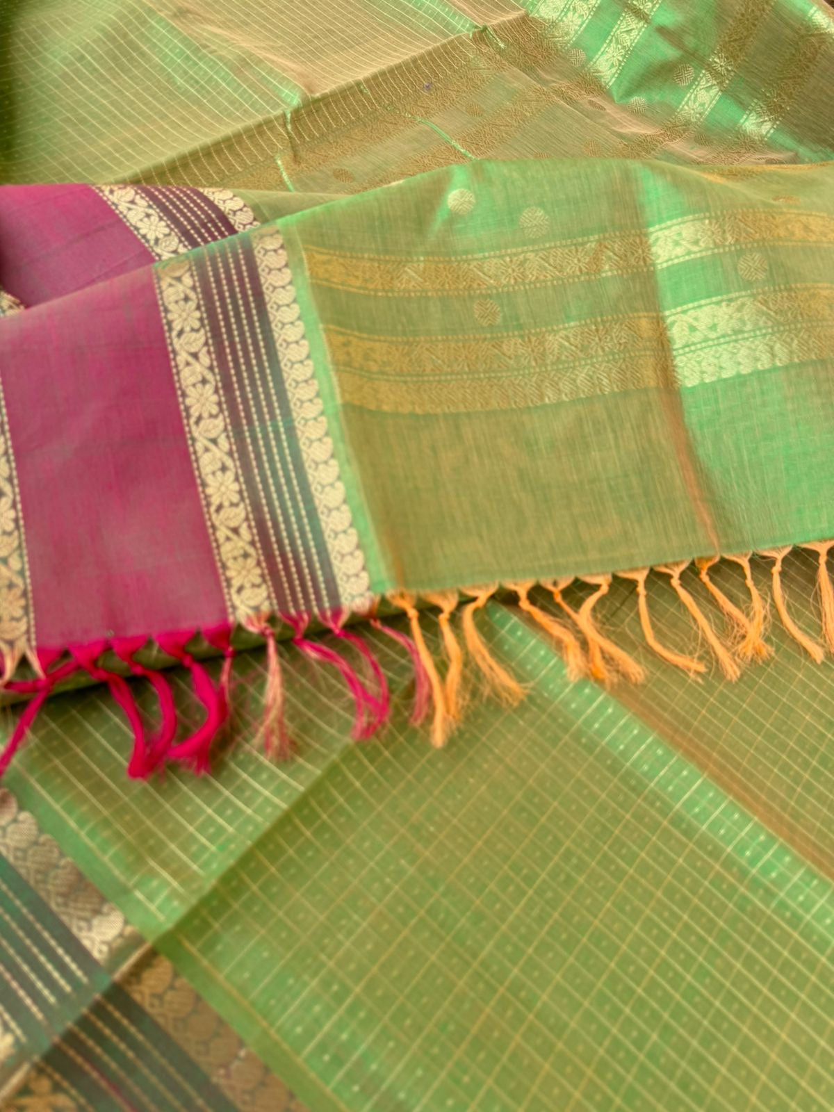 Zari Kissed Silk Cotton - pale pastel green lakshadeepam with parrots woven pallu