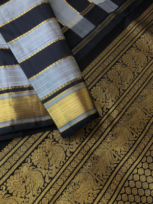 Radhee - Rare Find Kanchivarams - stunning black and grey train track veldhari body with gold zari borders and pallu