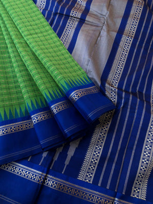 Mira - Our Exclusive Cotton body with Pure Silk Korvai Borders - parrot green and ms blue Lakshadeepam