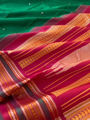 Sahasra - Beauty of No Zari Korvai Kanchivaram - beauty of meenakshi green and aaraku with traditional woven borders and pallu