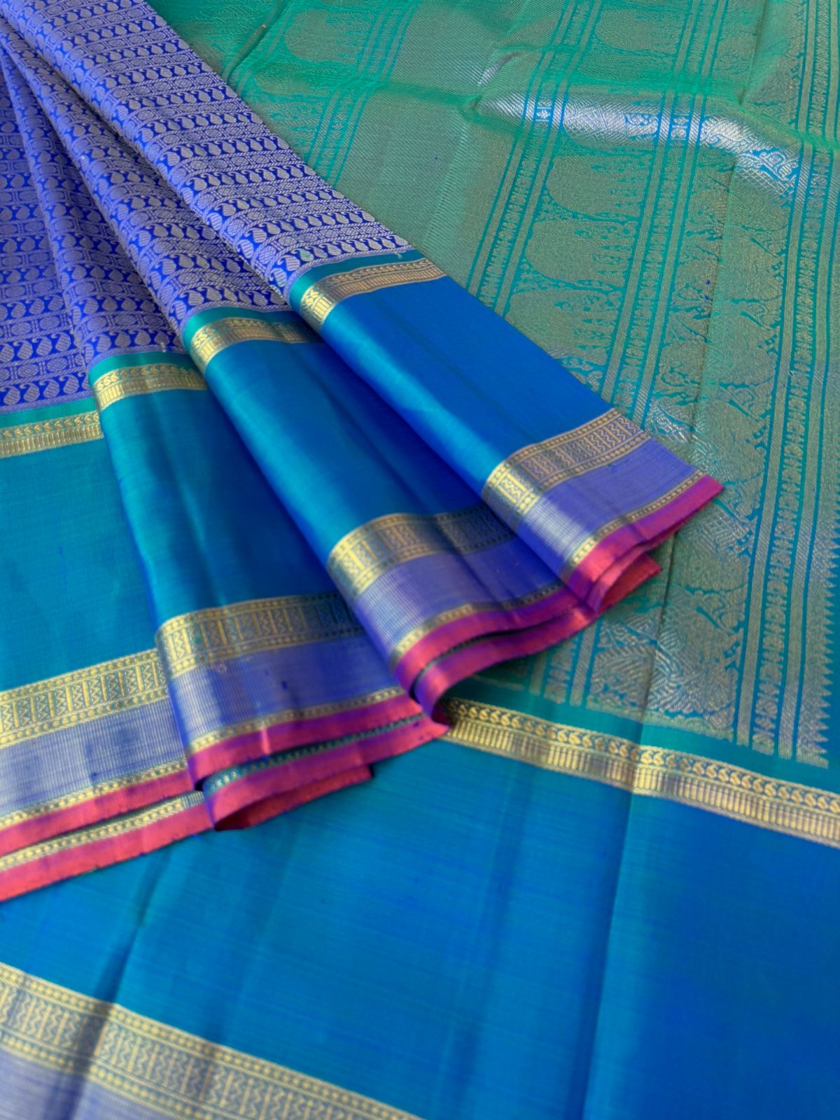 Haritham - Heirloom Yarn Play on Kanchivaram - absolutely stunning ms blue varusai pett woven body with beautiful gold zari woven borders pallu