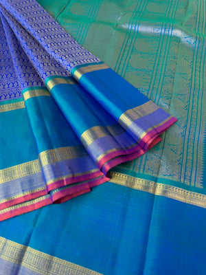 Haritham - Heirloom Yarn Play on Kanchivaram - absolutely stunning ms blue varusai pett woven body with beautiful gold zari woven borders pallu