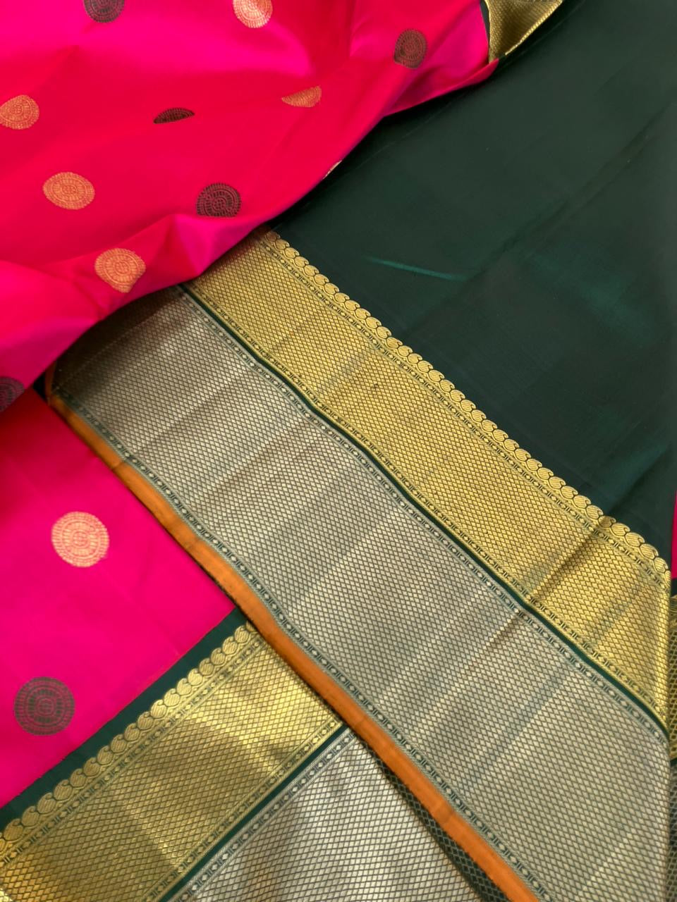 Vintage Vibes on Kanchivaram - the grandest pink and deep meenakshi green pattu and zari pett woven korvai borders with laddu kamalam woven borders