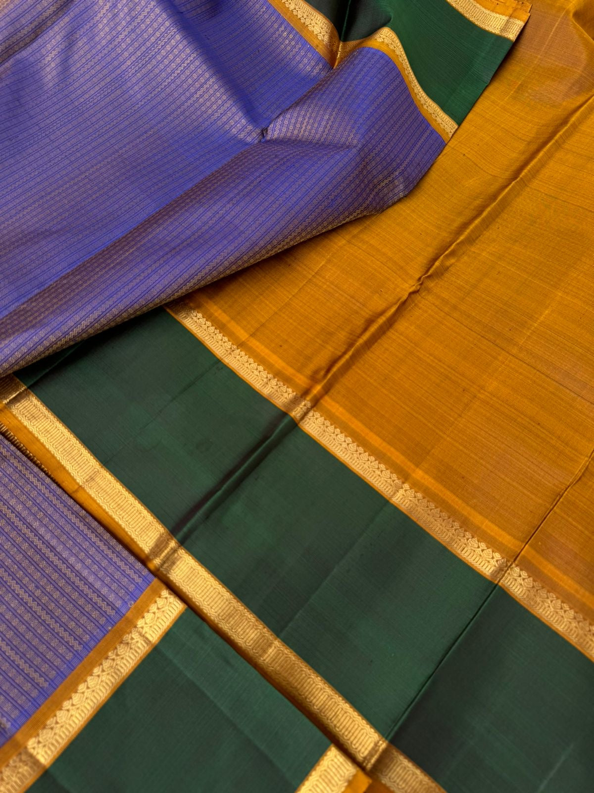 Kanchivaram Theory - dual tone golden blue and fenugreek tone with retta pett woven borders