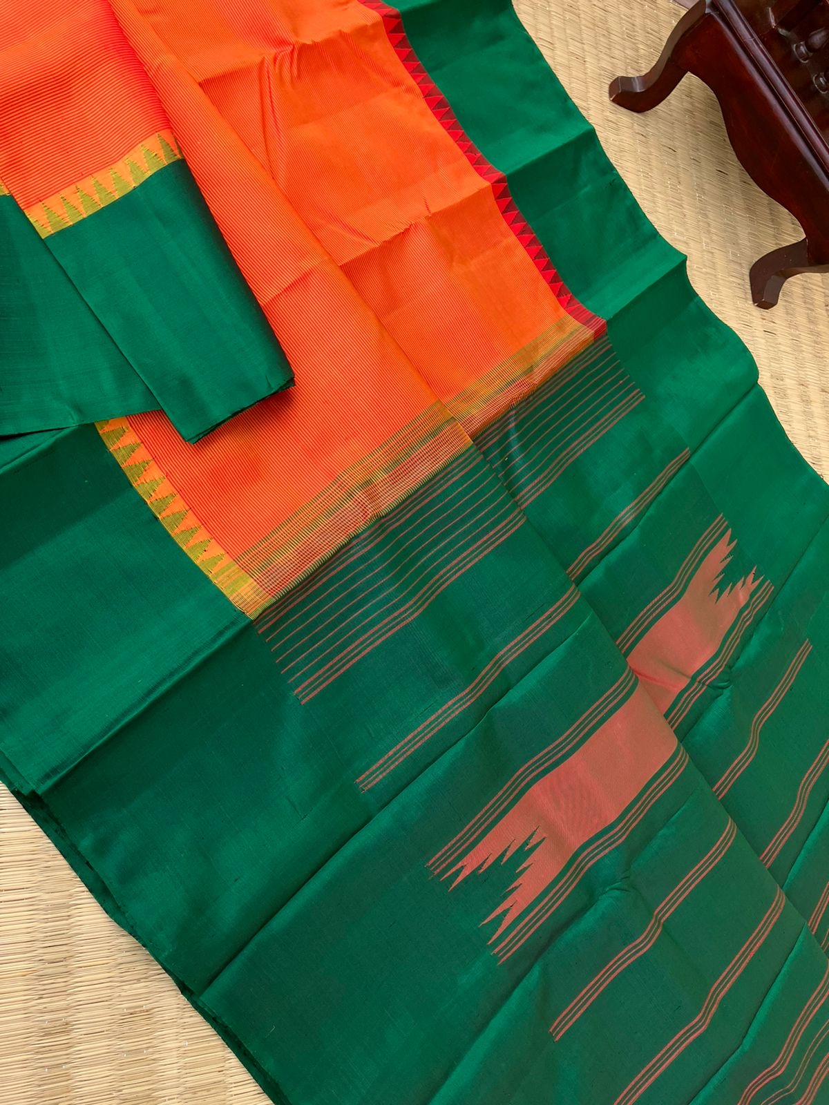 Kaavyam on Korvai Kanchivaram - burnt orange and meenakshi green