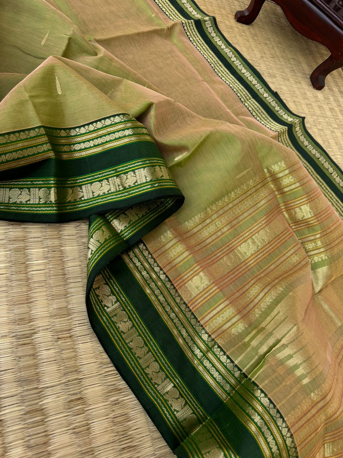 Zari Kissed Silk Cotton - unusual carrot orange and green mixed dual tone with annapakshi woven borders