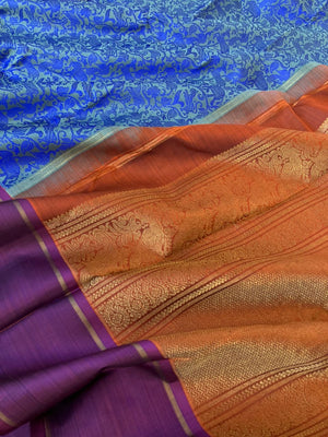 Haritham - Heirloom Yarn Play on Kanchivaram - blue on blue vanasingaram with rust pallu and blouse