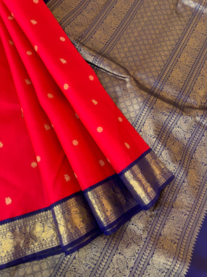 Tales of Korvais Kanchivaram - deep cherry red and navy blue is a vintage age old combination