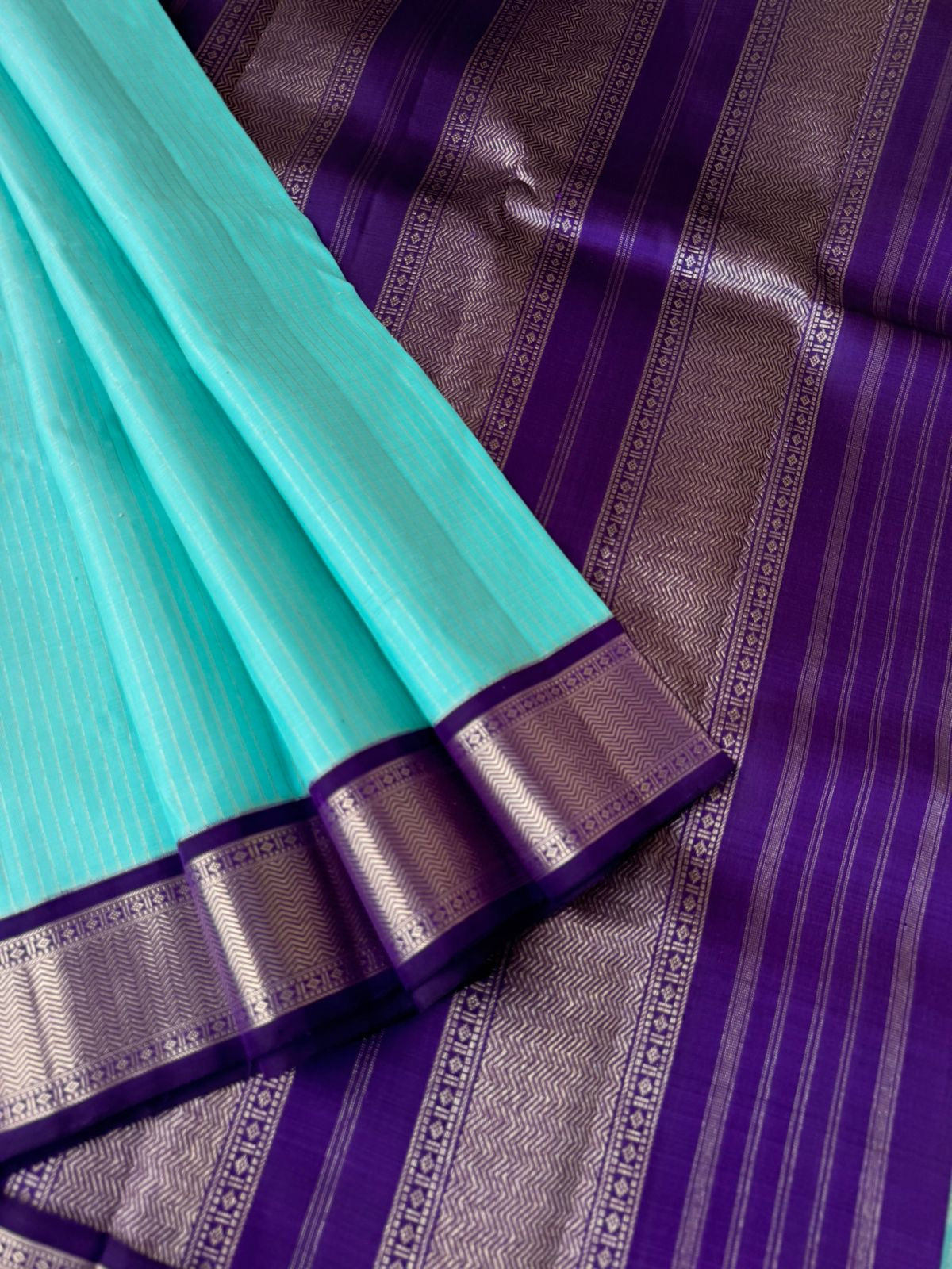 Interesting Kanchivarams - pastel baby blue and deep violet!! Combination made in heaven