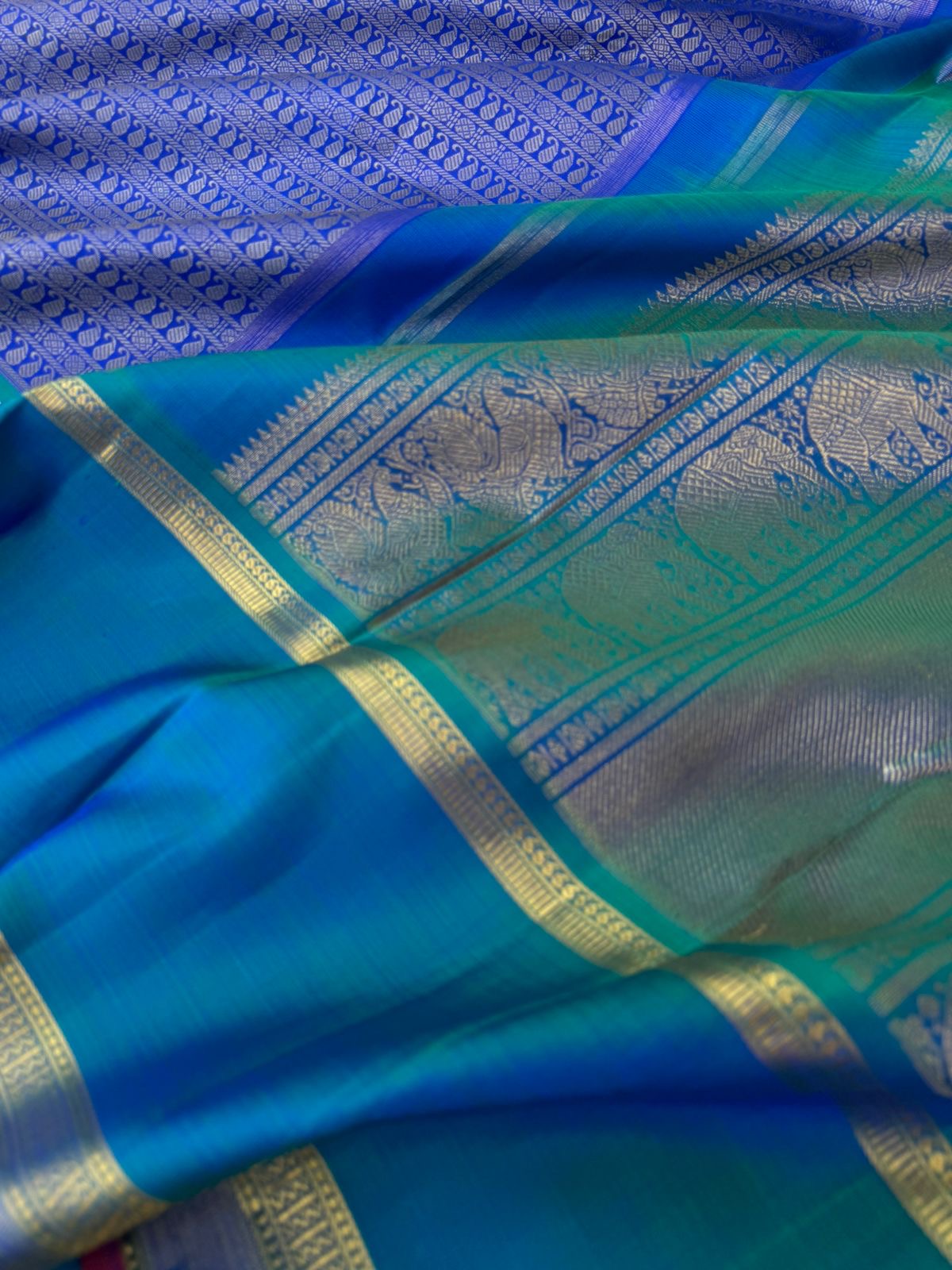 Haritham - Heirloom Yarn Play on Kanchivaram - absolutely stunning ms blue varusai pett woven body with beautiful gold zari woven borders pallu