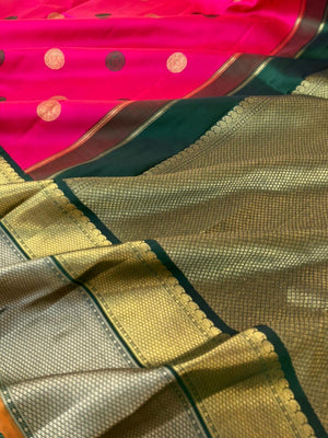 Vintage Vibes on Kanchivaram - the grandest pink and deep meenakshi green pattu and zari pett woven korvai borders with laddu kamalam woven borders