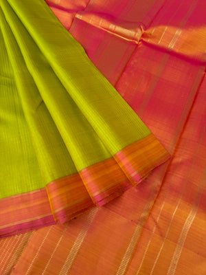 Bliss of Kanchivaram - fresh green and peach vertical gold oosi strips