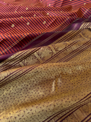 Kattam Koodu on Kanchivaram - rust and maroon podi kattam with Irruthalaipakshi woven borders