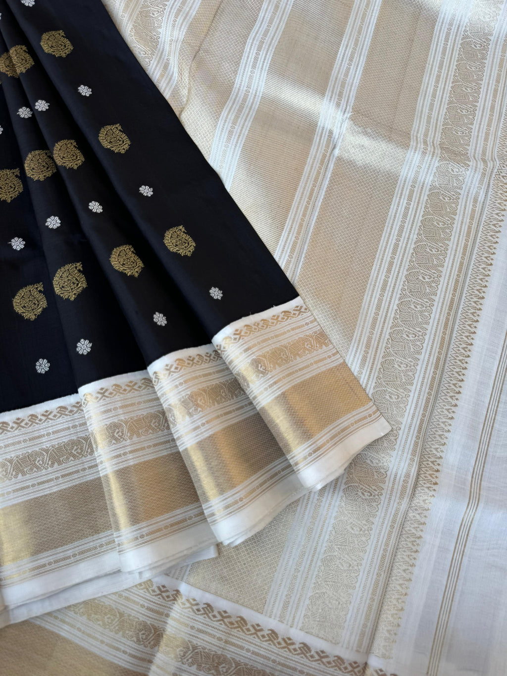 Tales of Korvais Kanchivaram - most beautiful black and off white with gold and silver zari woven buttas