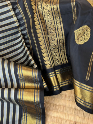 Leela - Darker effects on Kanchivaram - gorgeous black and grey stripes woven body highlighted with gold zari stripes !!