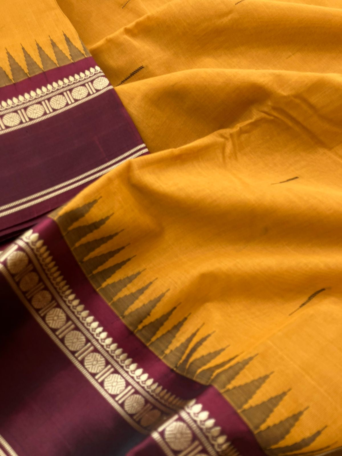 Mira - Our Exclusive Cotton body with Pure Silk Korvai Borders - traditional at the best manjal and deepest aaraku